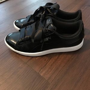 Brand new: Black leather Pumas